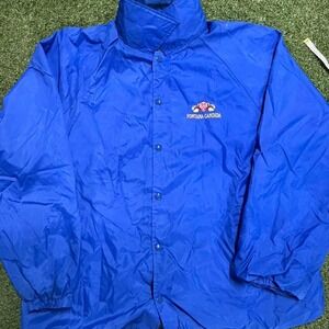 vintage blue nylon coach's jacket featuring an embroidered logo for the Italian